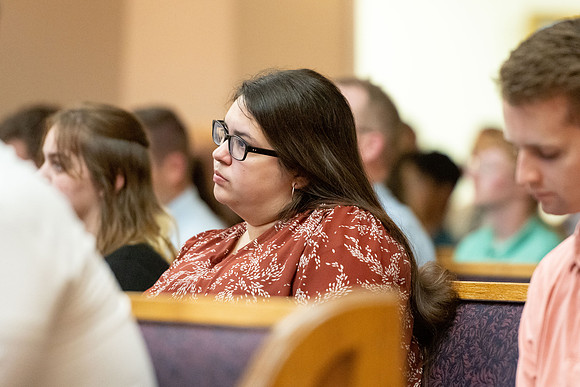 Students participating at devotional.