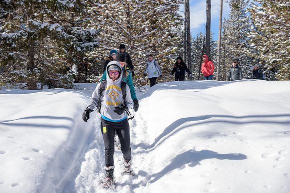 Students go snowshoeing at Harriman Park, located in Island Park, Idaho