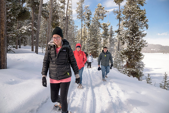 Students go snowshoeing at Harriman Park, located in Island Park, Idaho
