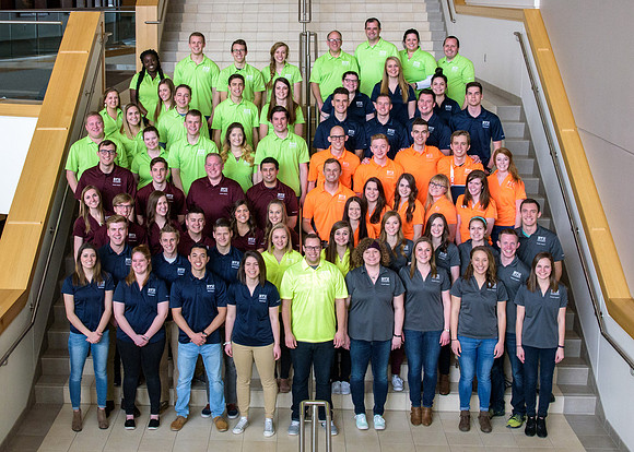 The various student support groups come together for a group photo.