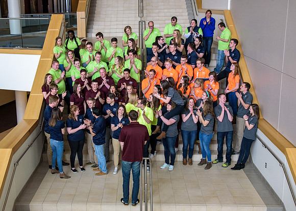 The various student support groups come together for a group photo.