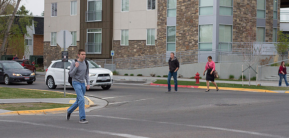 Students cross the street by the BYU-Idaho Stadium to make it to the 7:45A.M class on the first day during the 2014 Spring Semester.