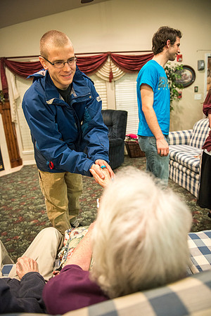 Students at Brigham Young University-Idaho visit a senior center in Rigby, Idaho and spend time with the senior citizens there.