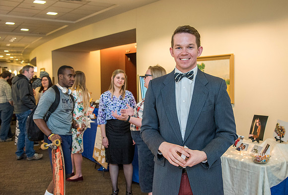 Communications majors ready to graduate display their senior projects.