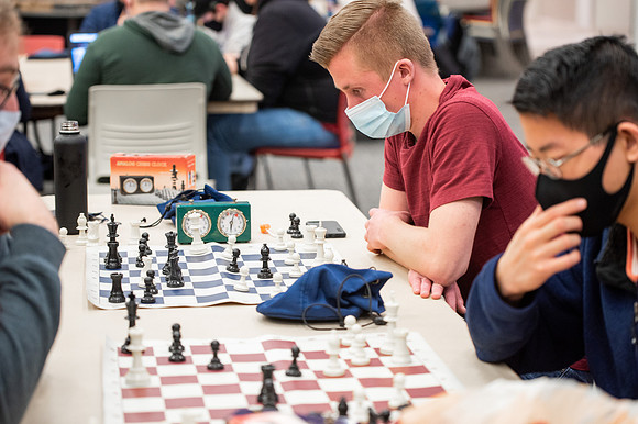 BYUI students play chess in the Manwaring Center.