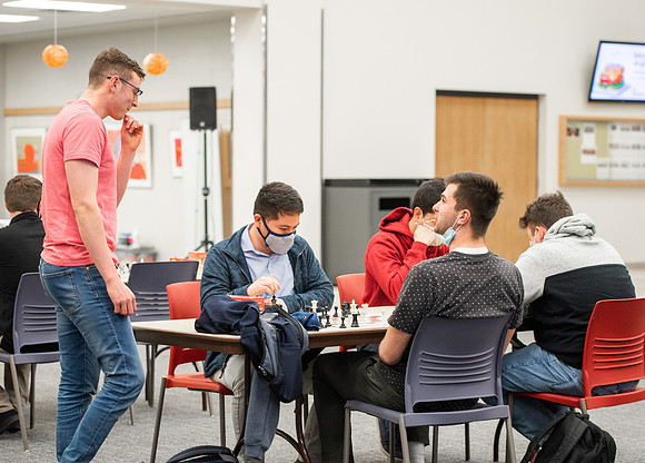 BYUI students play chess in the Manwaring Center.