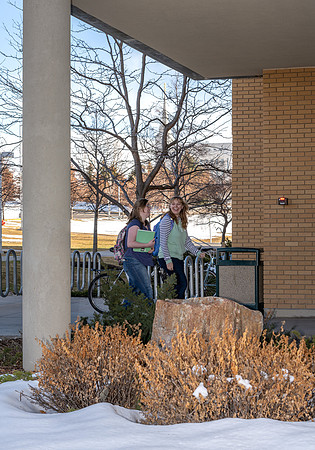 A view of the Temple from BYU-Idaho campus with students in the foreground.