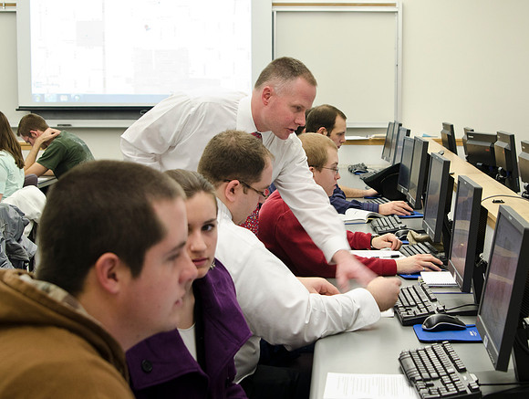 Sean Cannon teaches Geography 230 Intro to Geographic Info Systems.  In class today students were downloading a Google map zoomed into Rexburg then identifying streets in a new layer to create a local