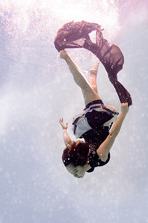 Dance students try posing underwater in the Hart pool.