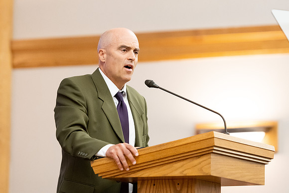 Mat Miles addresses students and faculty during the weekly devotional at BYU-Idaho.