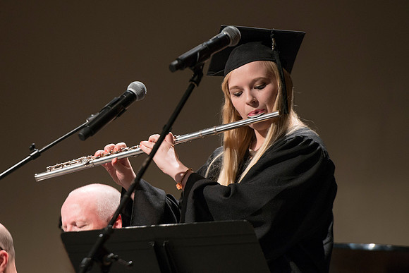 College of Language and Letters Convocation in the Manwaring Center Ballroom. Musical number: Flute accompaniement by Bunni Baltazar.