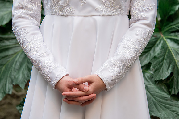 BYUI bridal students model the dresses they made for Sister Orme's bridal sewing class.
