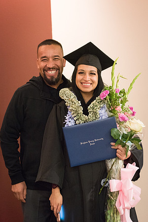 Graduates gather with family and friends.