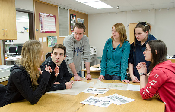 College horticulture class works with high school students to redesign the Clark playground facilities.