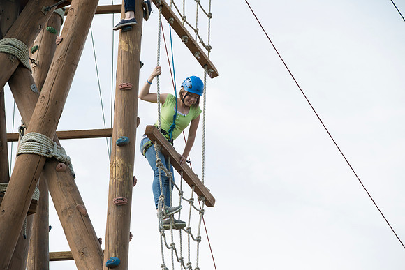 Youth high enjoy the Ropes Course class.