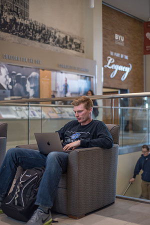 A student studies in the Hyrum Manwaring Center. 2017