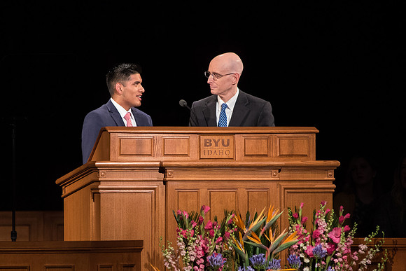 President Henry J. Eyring speaks with a student about "saying hello to everyone on campus."