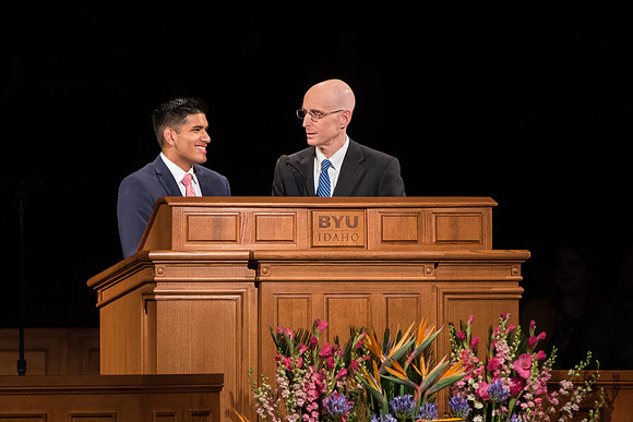 President Henry J. Eyring speaks with a student about "saying hello to everyone on campus."