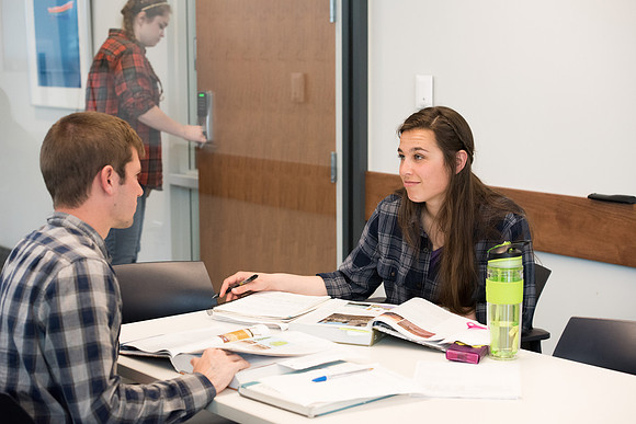 Students get back to school and begin their studies in the Science and Technology Building.
