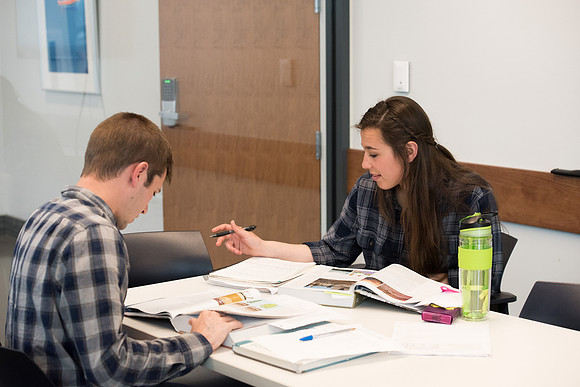 Students get back to school and begin their studies in the Science and Technology Building.