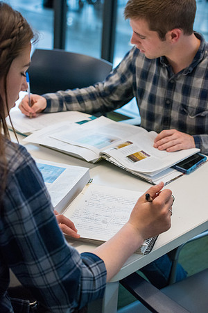 Students get back to school and begin their studies in the Science and Technology Building.