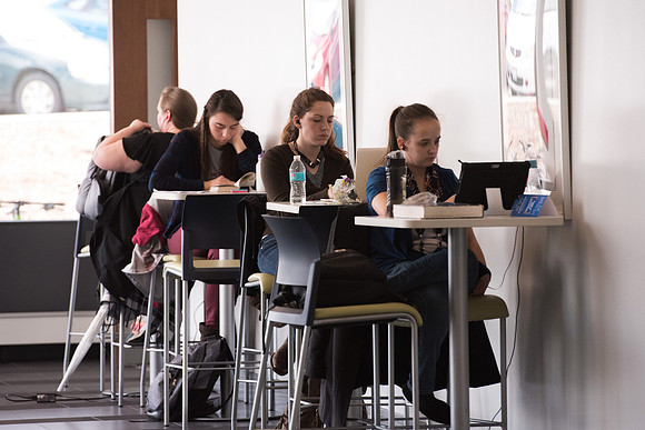 Students get back to school and begin their studies in the Science and Technology Building.