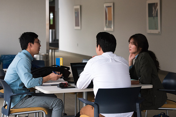 Students get back to school and begin their studies in the Science and Technology Building.