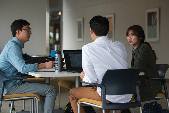 Students get back to school and begin their studies in the Science and Technology Building.