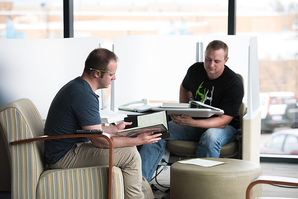 Students get back to school and begin their studies in the Science and Technology Building.