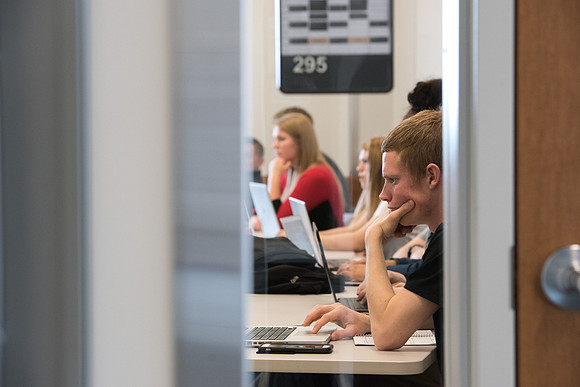Students get back to school and begin their studies in the Science and Technology Building.