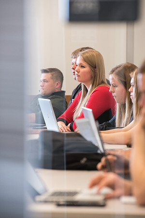 Students get back to school and begin their studies in the Science and Technology Building.