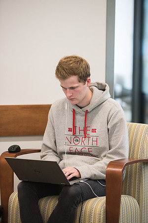 Students get back to school and begin their studies in the Science and Technology Building.