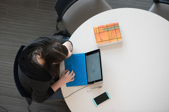 Students get back to school and begin their studies in the Science and Technology Building.