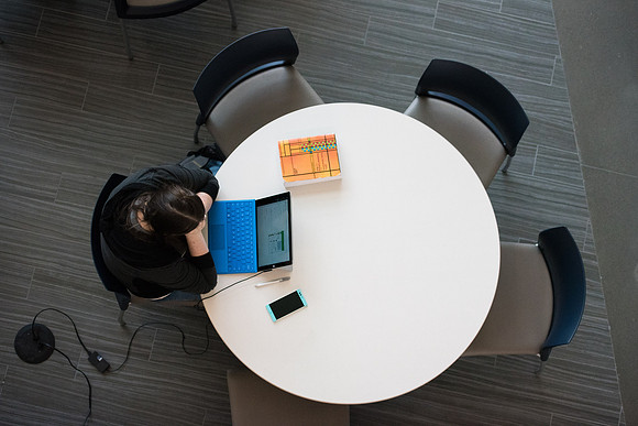Students get back to school and begin their studies in the Science and Technology Building.