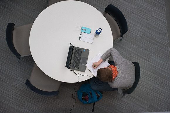 Students get back to school and begin their studies in the Science and Technology Building.