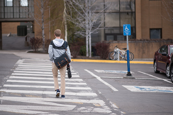 Taylor Williams walks on the BYU-Idaho campus. 2017