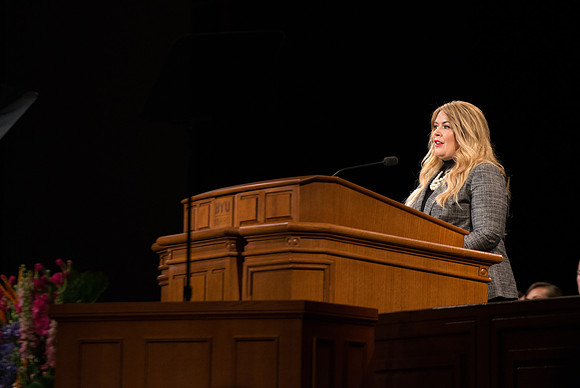 Students and employees gather in the BYU-Idaho Center for the first devotional of Spring 2107 semester. Amy LaBaugh conducts devotional.