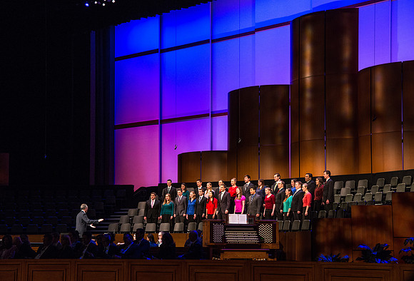 Students and employees gather in the BYU-Idaho Center for the first devotional of Spring 2107 semester. Musical number by the Collegiate Singers.