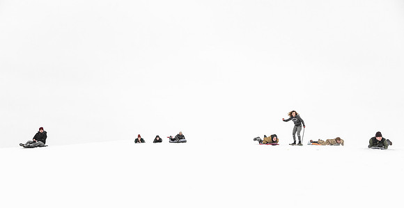 An Home evening group goes sledding.