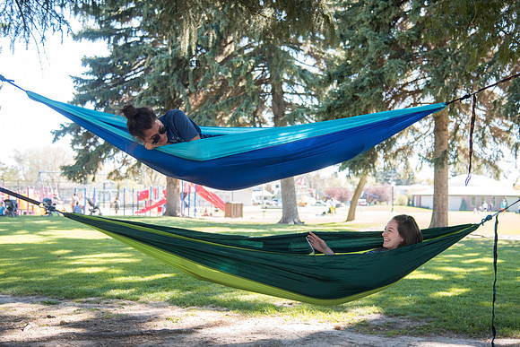 Students love to put up hammocks at Porter Park during the Spring semester.
