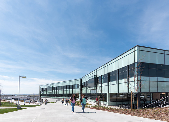 Students walk in front of the STC Building. 2017