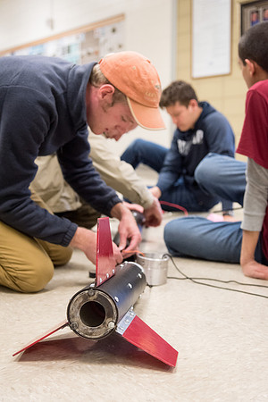 The Rocket Team from the Mechanical Engineering Department gather together to prepare for their rocket launch.