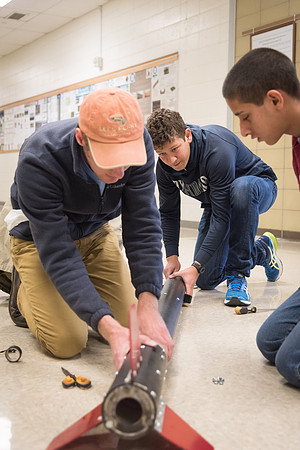 The Rocket Team from the Mechanical Engineering Department gather together to prepare for their rocket launch.