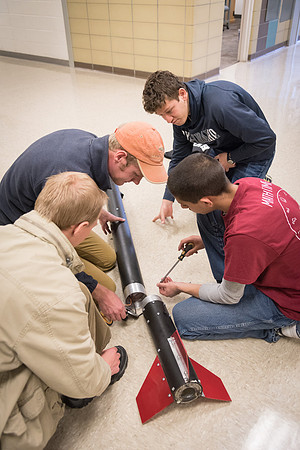The Rocket Team from the Mechanical Engineering Department gather together to prepare for their rocket launch.