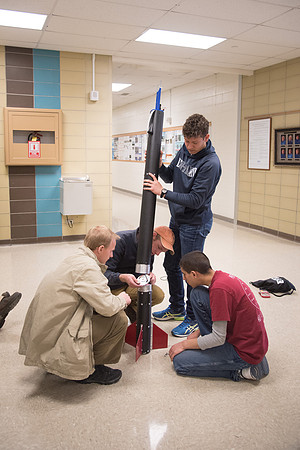 The Rocket Team from the Mechanical Engineering Department gather together to prepare for their rocket launch.