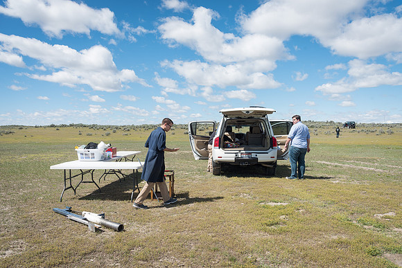 The Rocket Team from the Mechanical Engineering Department gather together to prepare for their rocket launch.
