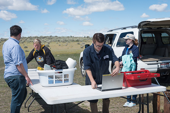 The Rocket Team from the Mechanical Engineering Department gather together to prepare for their rocket launch.