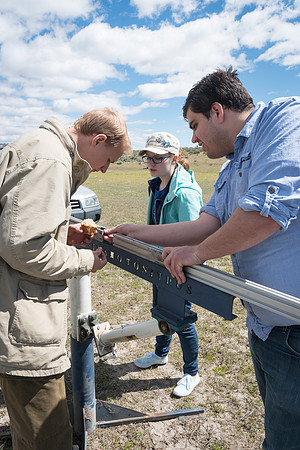 The Rocket Team from the Mechanical Engineering Department gather together to prepare for their rocket launch.