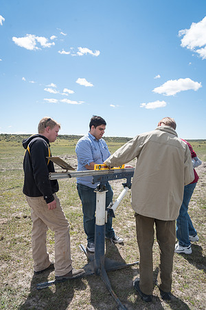The Rocket Team from the Mechanical Engineering Department gather together to prepare for their rocket launch.