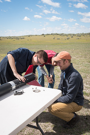 The Rocket Team from the Mechanical Engineering Department gather together to prepare for their rocket launch.